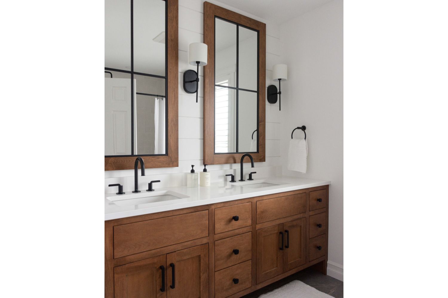 Custom frame inset bathroom vanity in warm wood stain