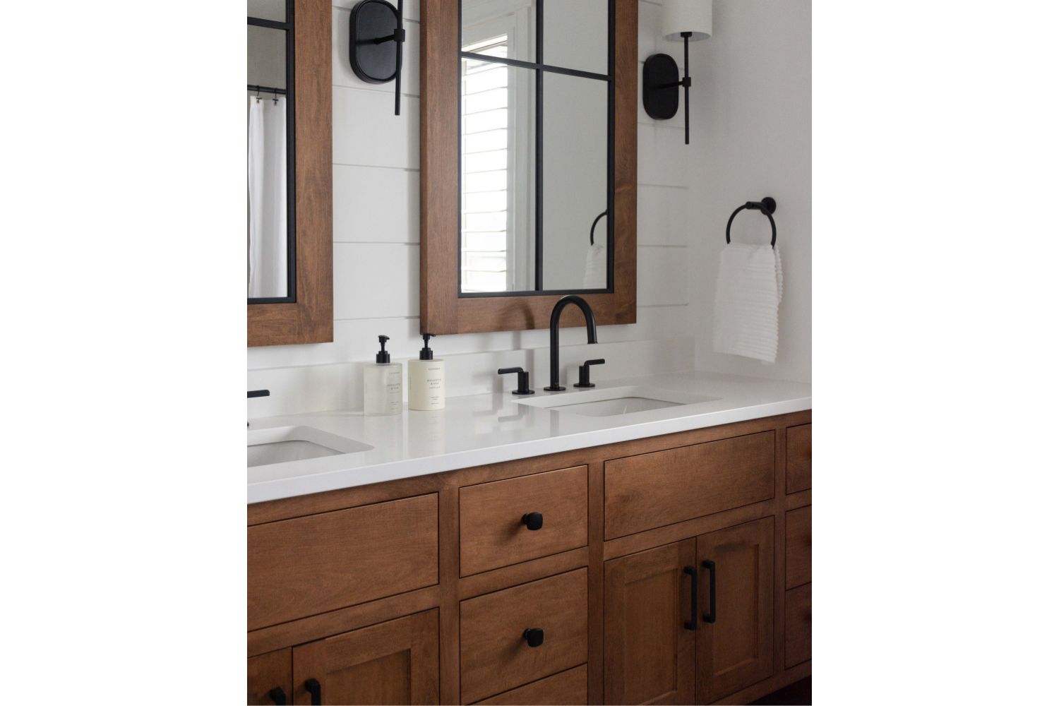 Timeless bathroom vanity design with matching custom mirrors