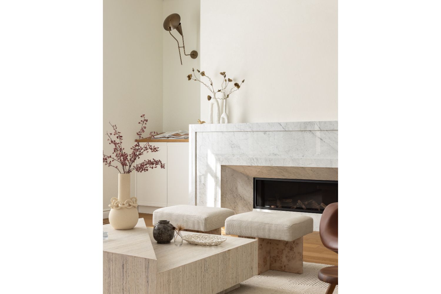 White fireplace wall cabinets with warm white oak wood tops