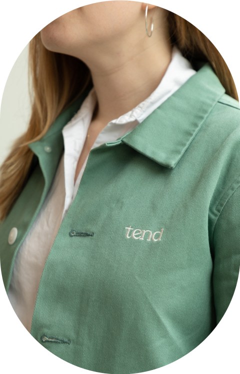 A close up of a Tend branded shirt.