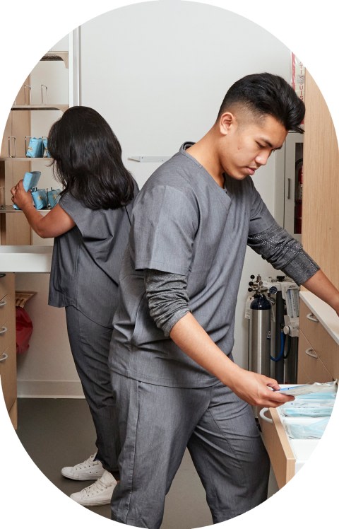 Two Tend employees are working in the sterilization area.