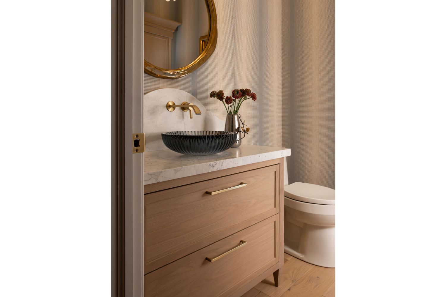Timeless white oak vanity with curved backsplash