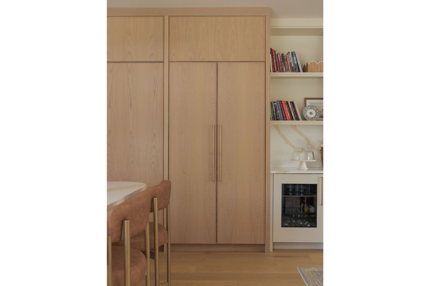 Tall white oak pocket door coffee bar