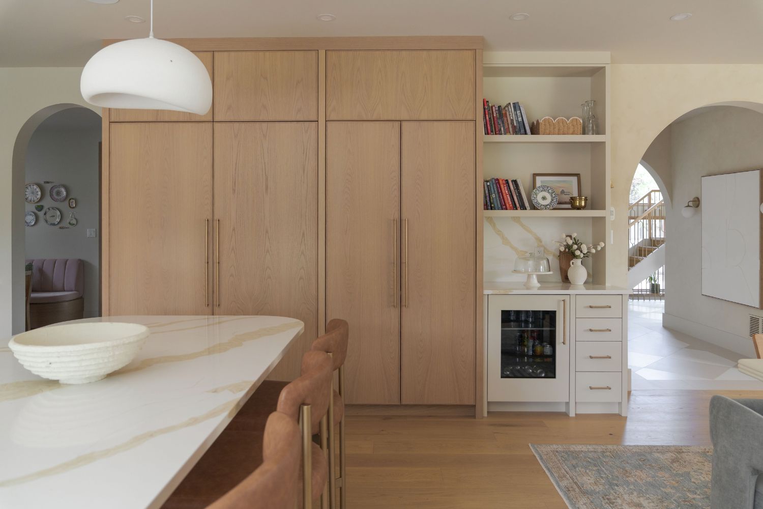 Panel ready white oak fridge and white oak pocket doors