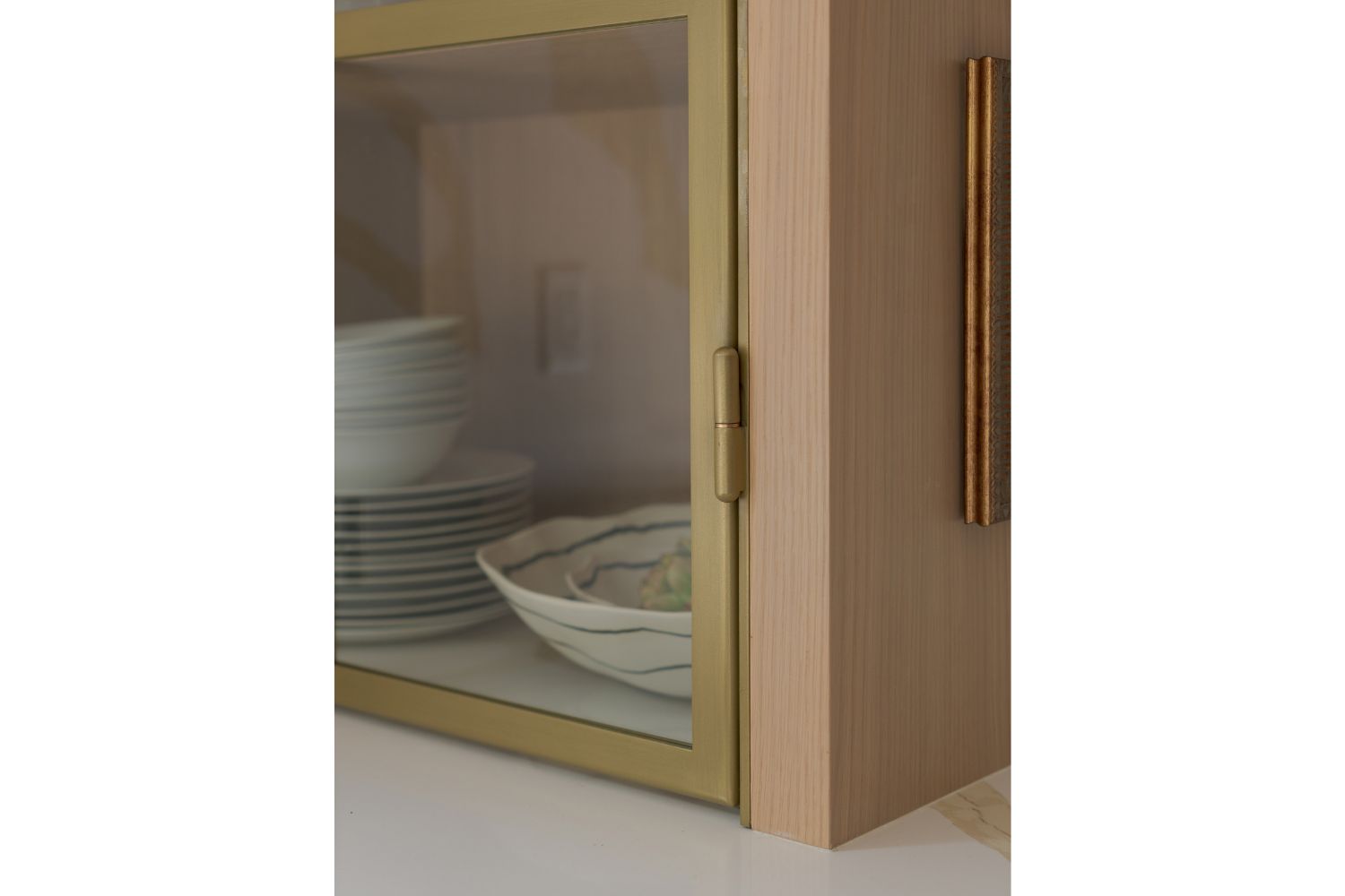 Gold bullet hinges on metal framed glass door countertop hutch c