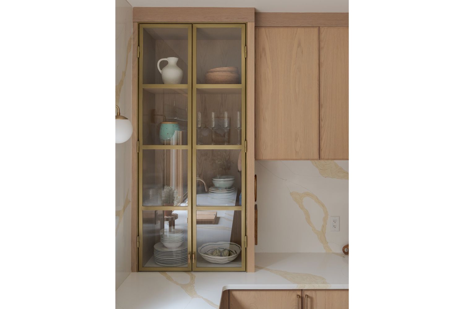 Gold framed glass door countertop hutch