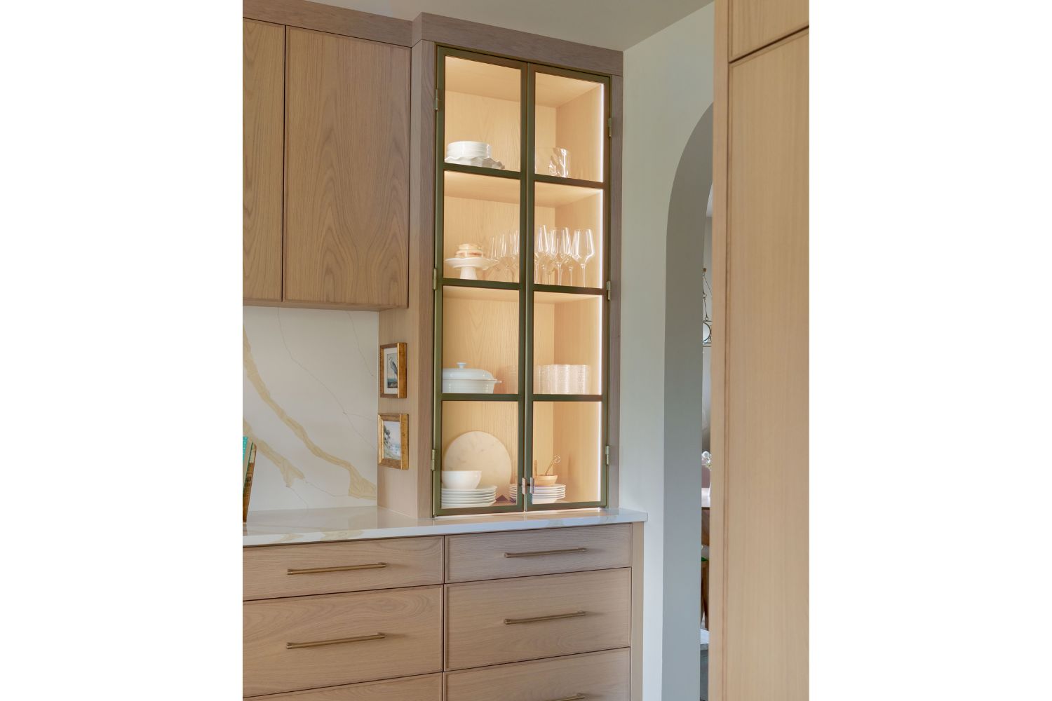 Luxury white oak kitchen design with light up countertop cabinet