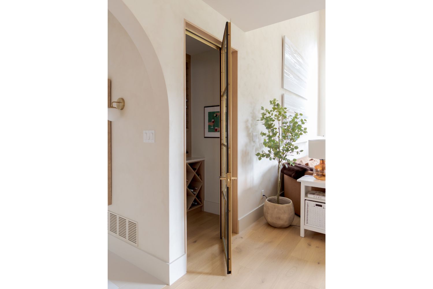 Luxury wine room with metal framed glass door