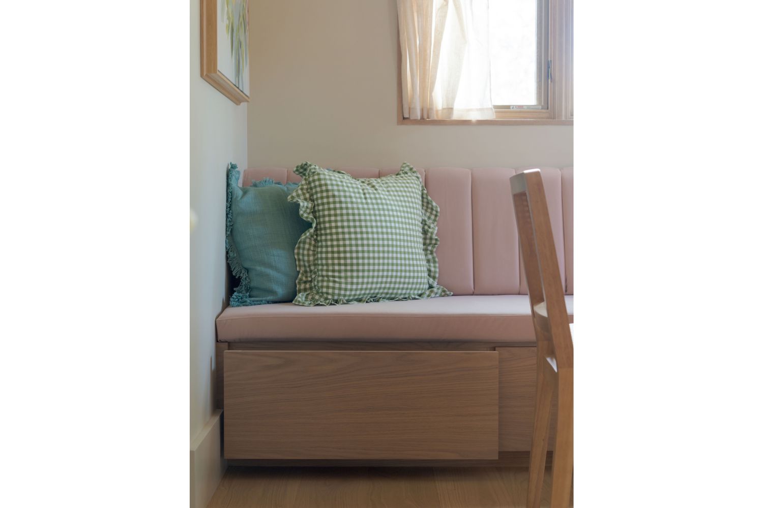 Custom banquette with hidden storage drawers